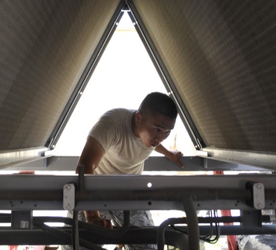 Air conditioning technician at work