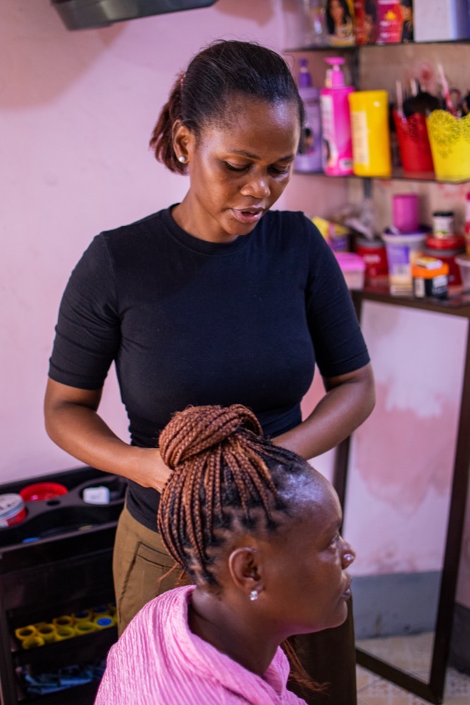 Hair stylist with client