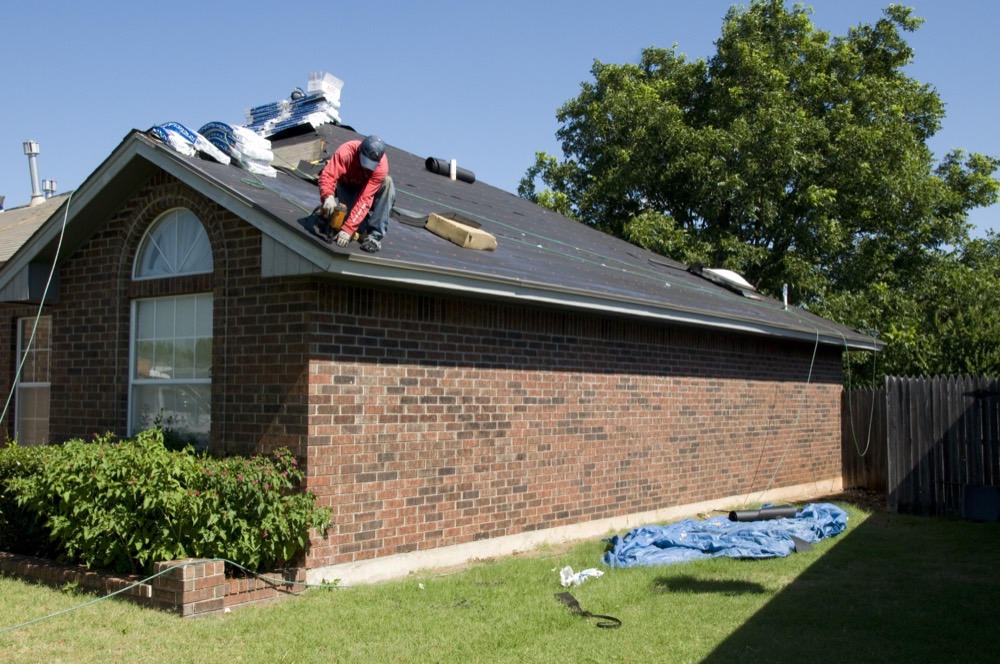 Roofer at work